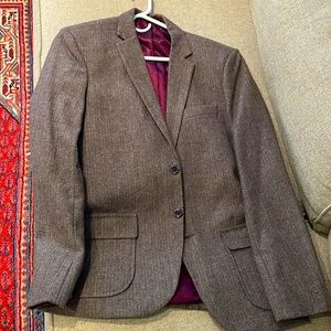 Custom tweed blazer.